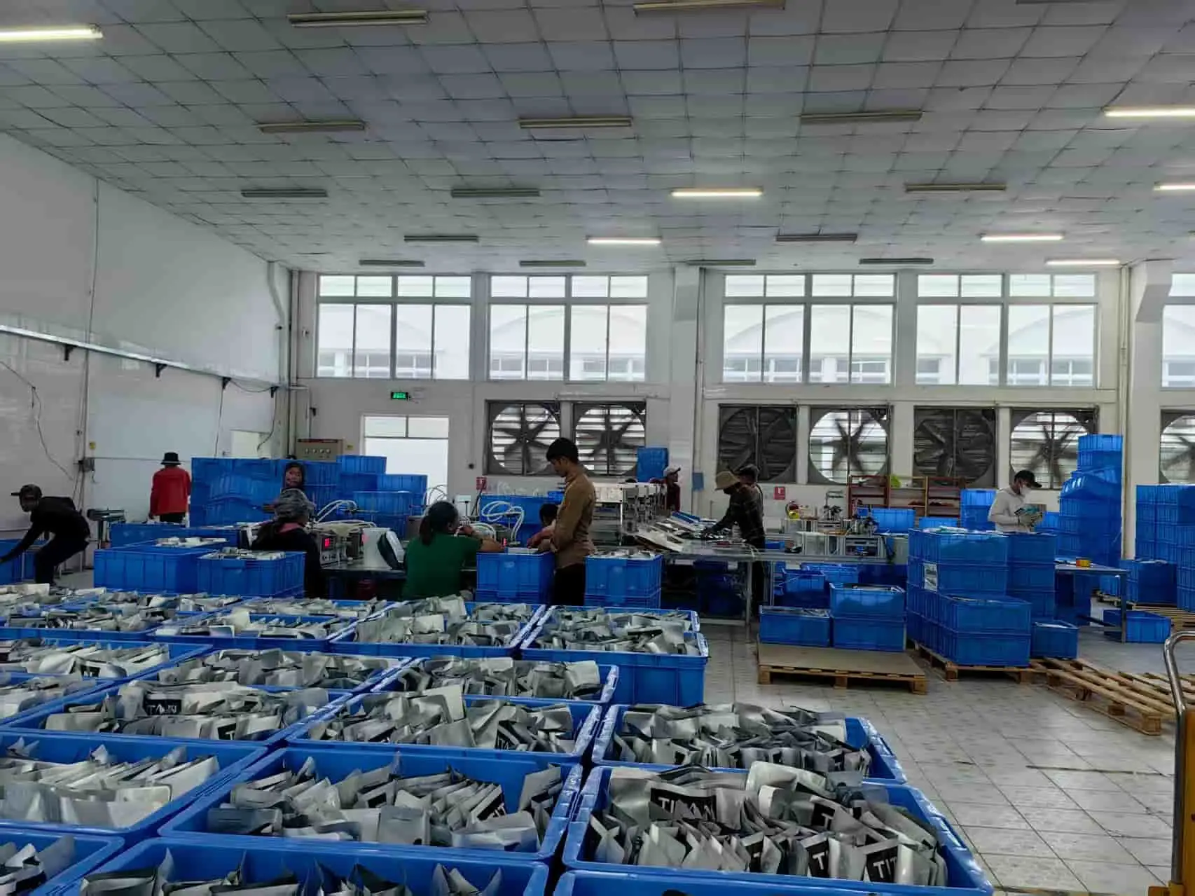 Cryozin production area with finished components arranged in blue bins