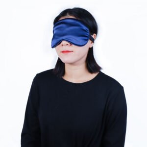 Blue fabric-covered eye wrap worn over the eyes