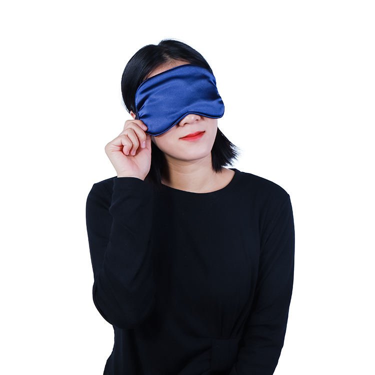 Blue fabric-covered eye wrap shown with the front edge lifted