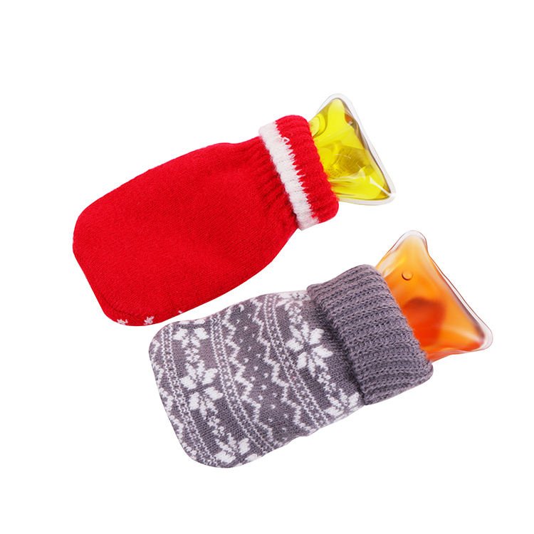 Gray and red knit covers holding reusable click heat packs