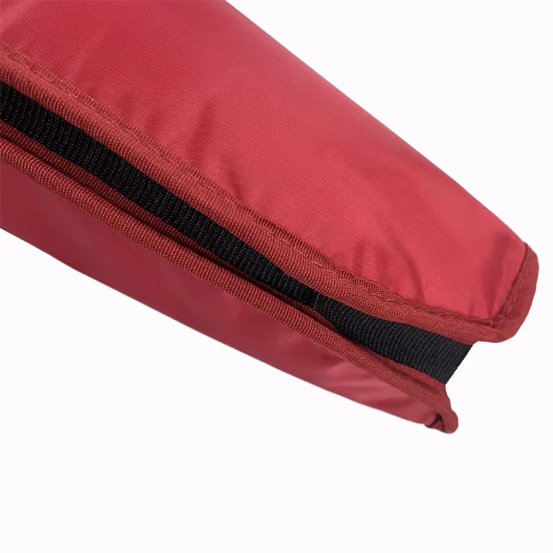 Close catalog view of the bound red sleeve edges and black elastic side connection