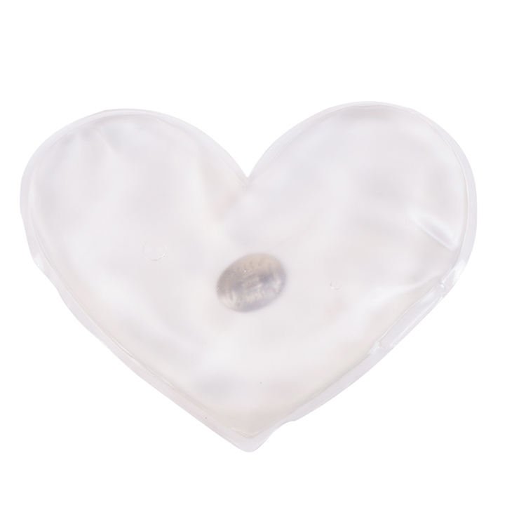 Clear heart-shaped heat pack with visible disc