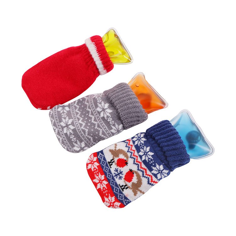 Three knit covers with yellow orange and blue heat pack inserts