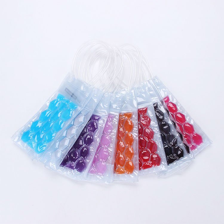 Catalog arrangement of clear bottle bags with colored filled cell panels and loop handles