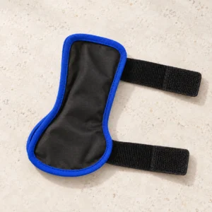 Black dog leg wrap with blue bound edges and two fastening bands laid open