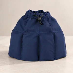 Navy drawstring head wrap with multiple lower insert pockets