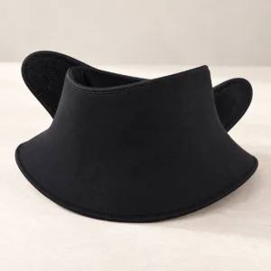 Black flared gel neck collar with overlapping front wings on a neutral surface
