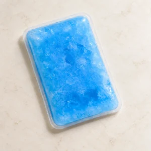 Flat blue phone cooling pack with rounded corners and a pale sealed edge