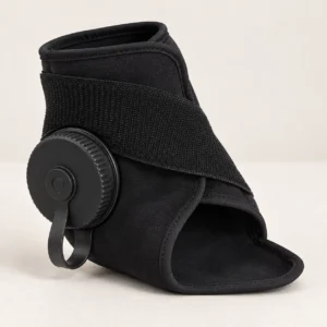 Black refillable ankle ice wrap with a large side screw cap