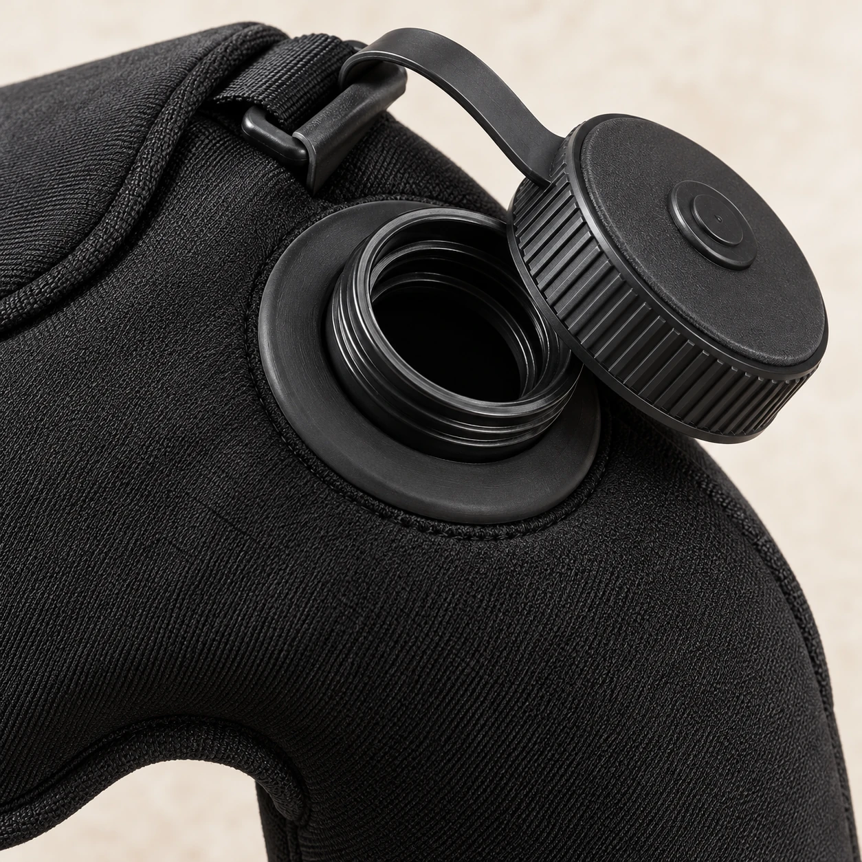 Close view of the shoulder-wrap screw cap and bound opening